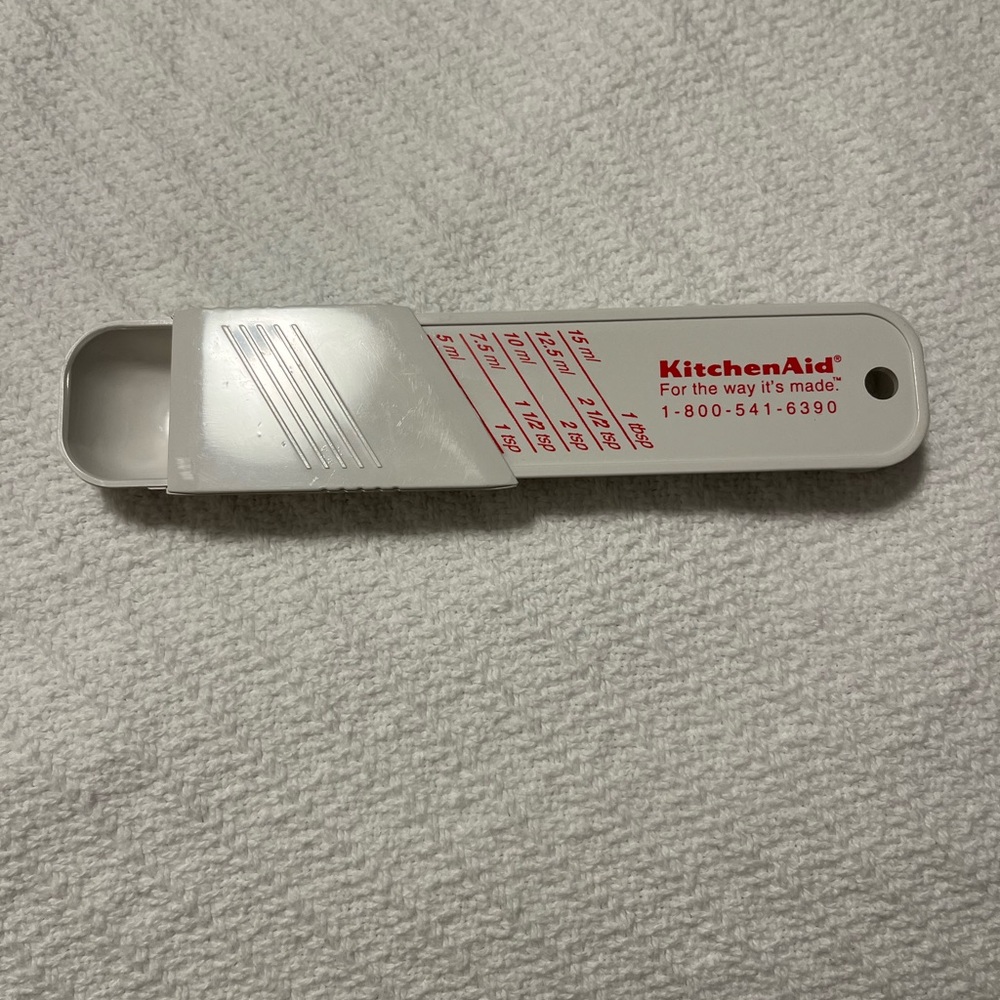 Vintage KitchenAid Adjustable White Measuring Spoon